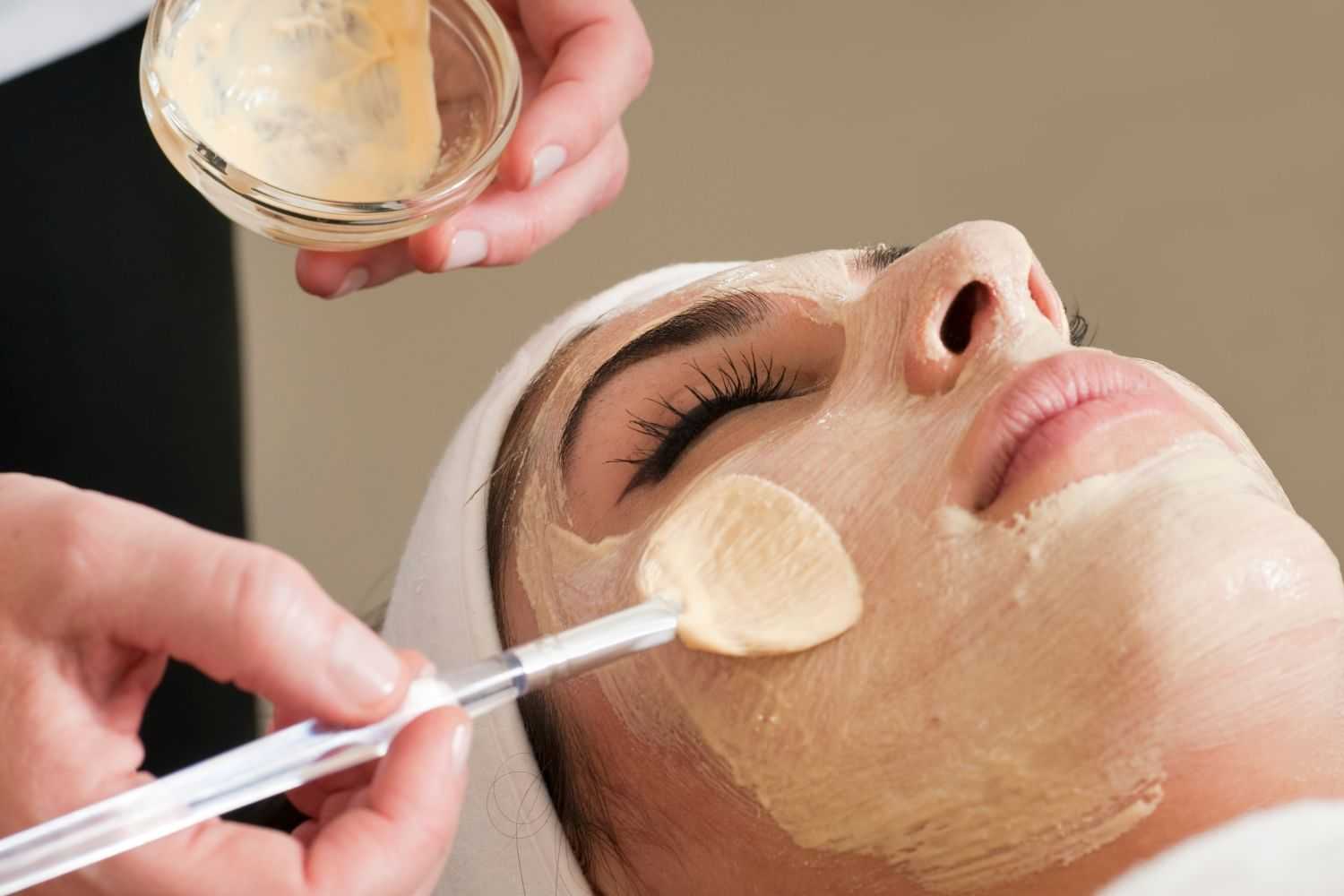 Facial mask being applied at a spa.